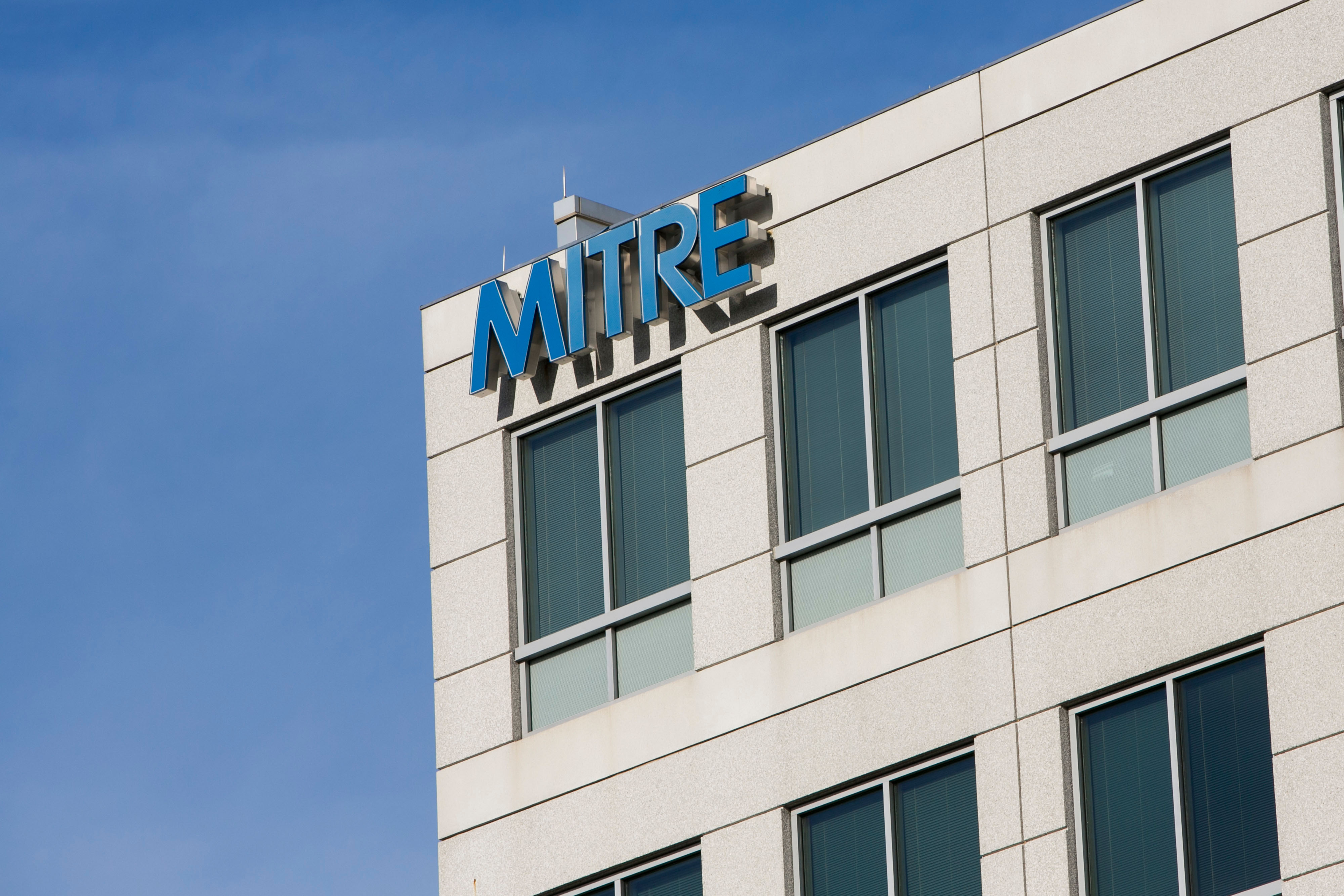The exterior of a building with a sign that says MITRE