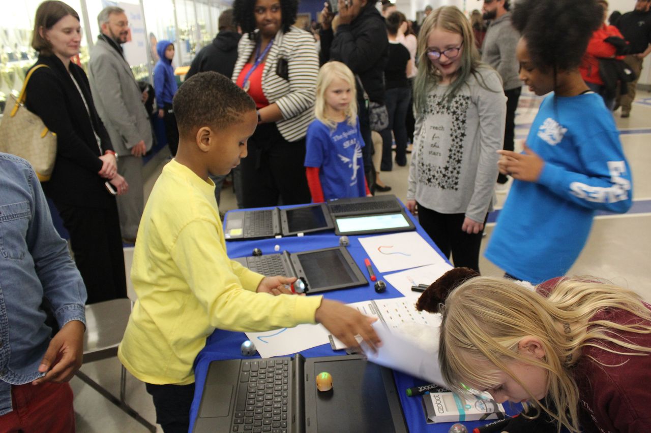 Elementary school students in South Boston use robots to learn coding principles