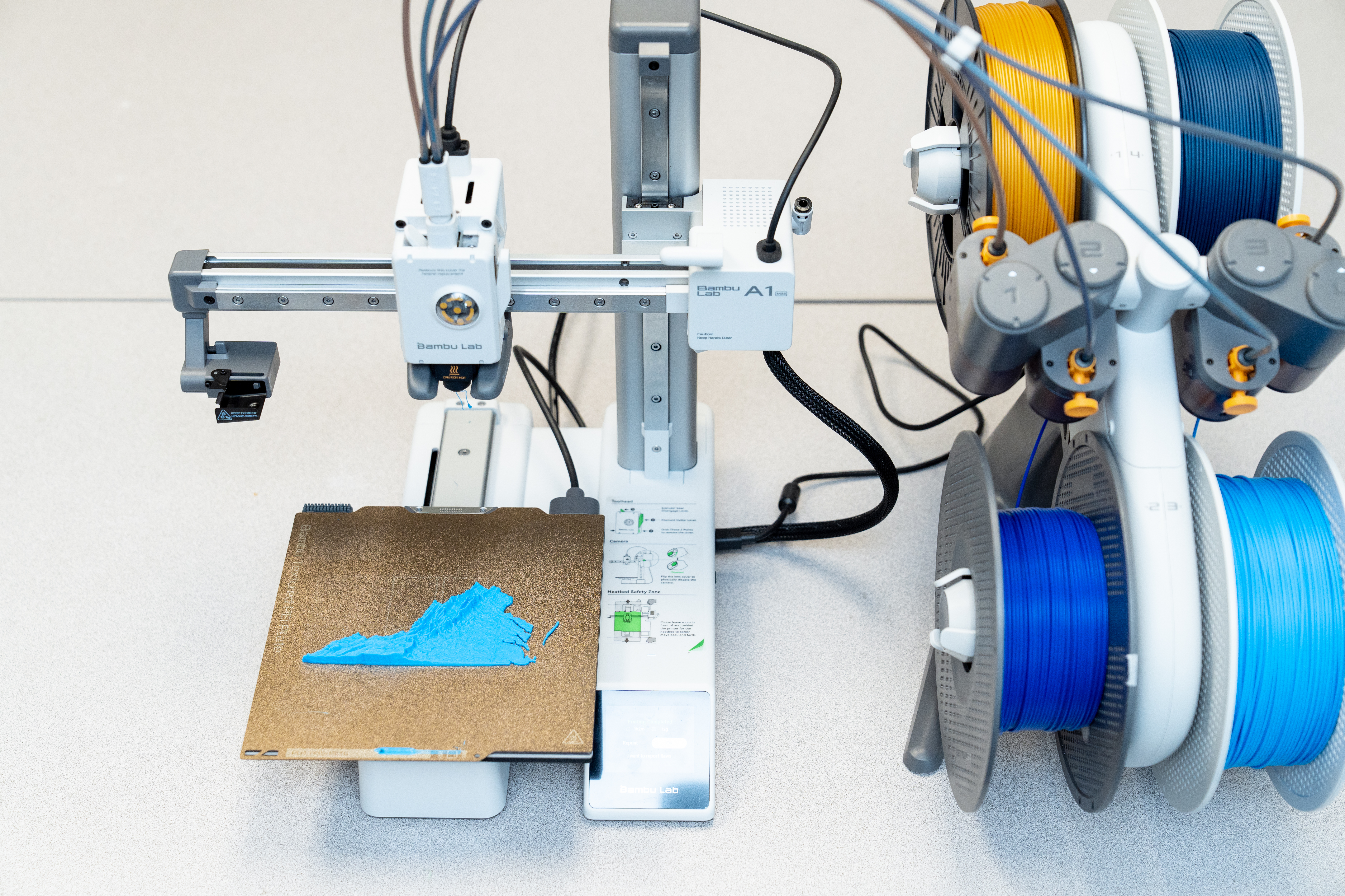 A 3D printer creates a map of Virginia