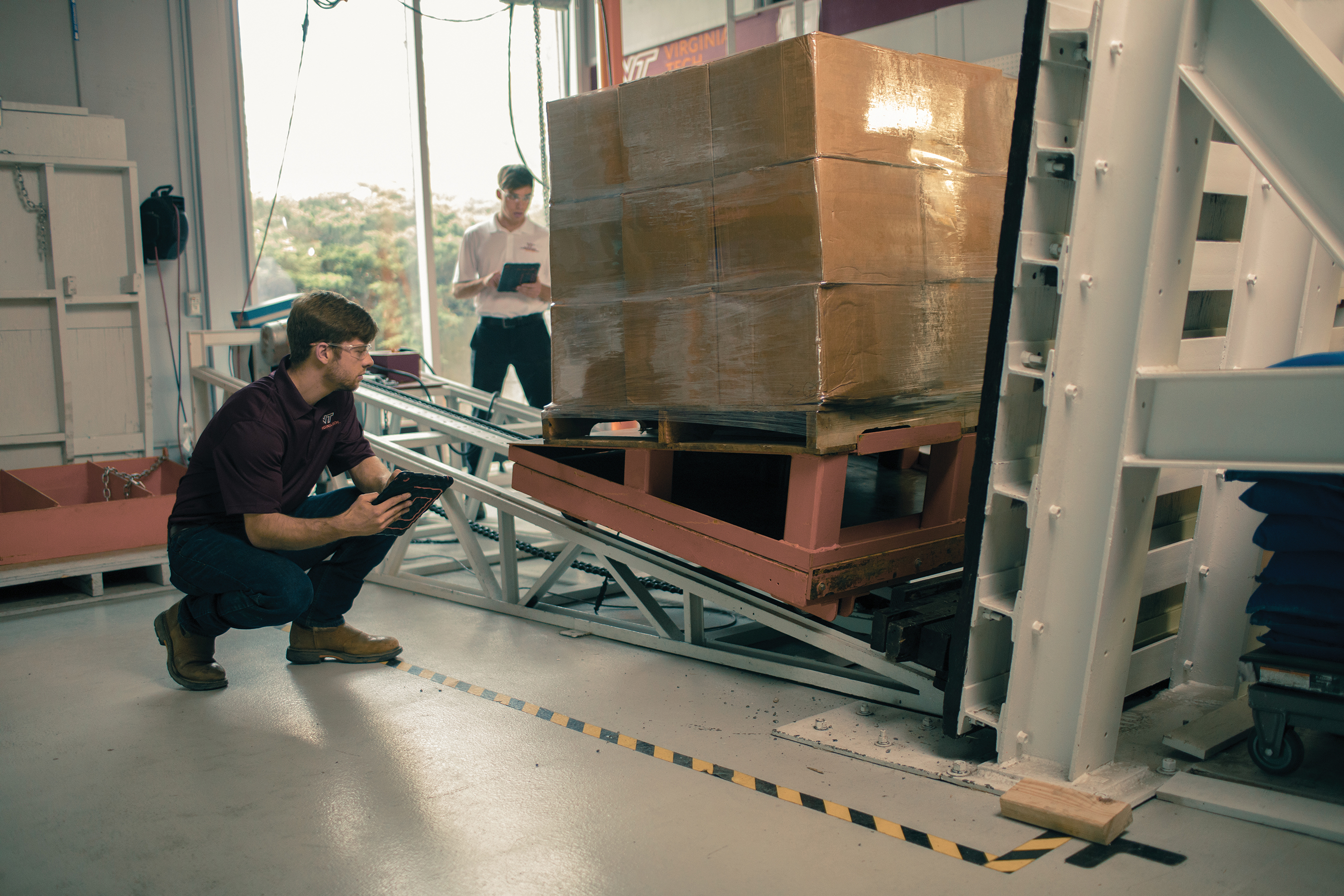 Photo of a Virginia Tech student at the Center for Packaging and Unit Load Design