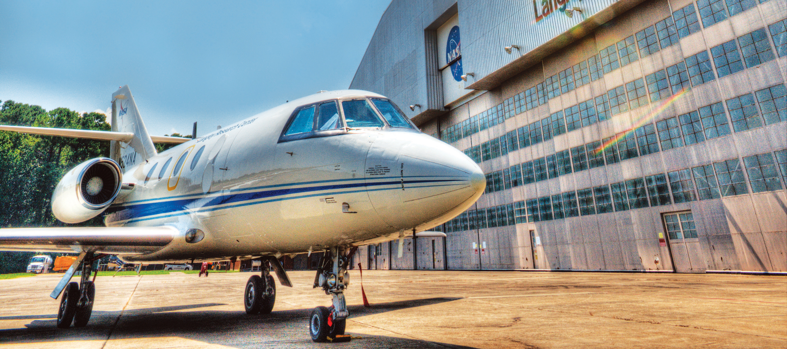 An aircraft sits outside the Langley hanger