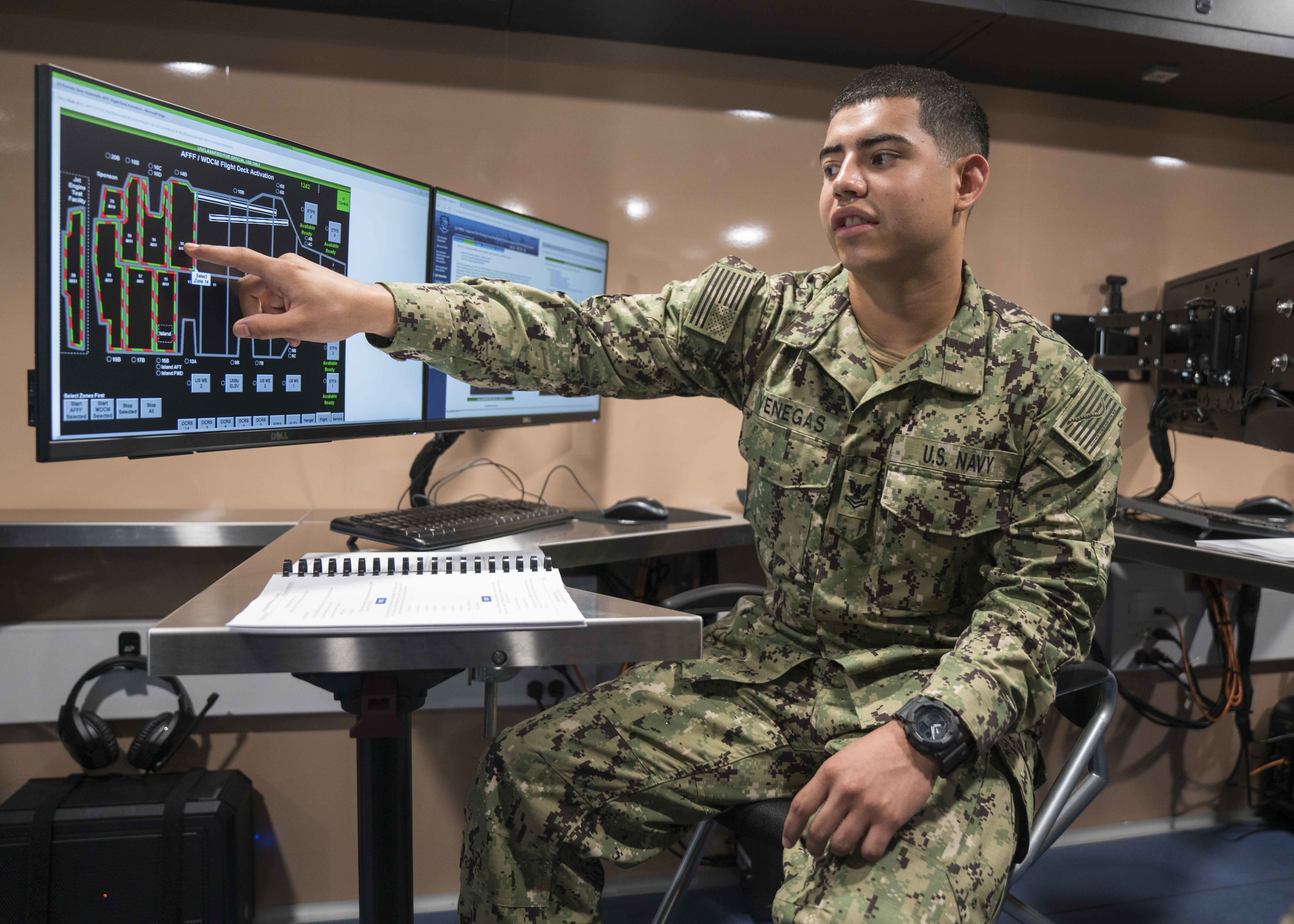 Veteran in front of a computer 