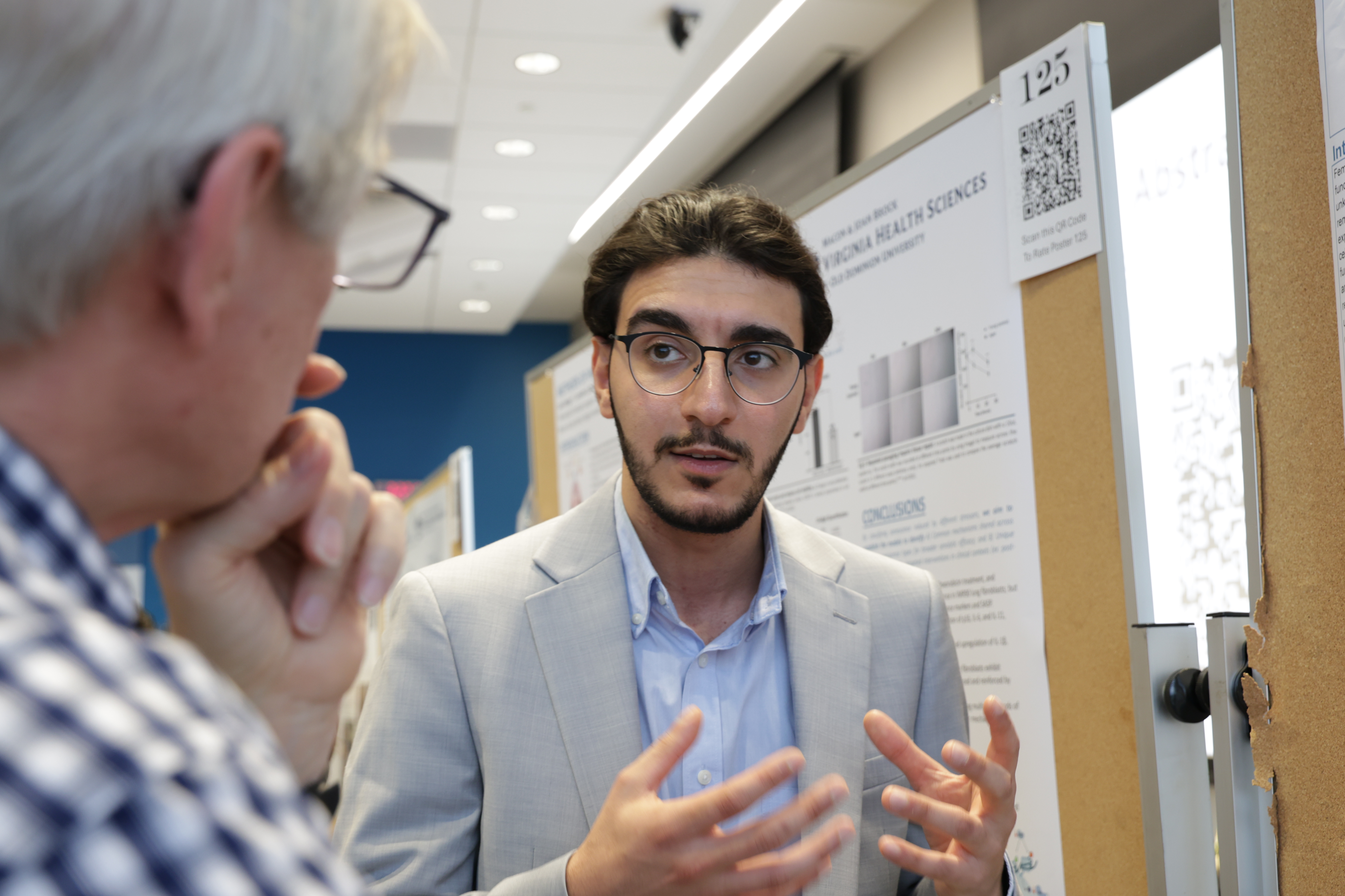 Student presenting research. 