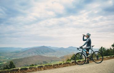 Cyclist takes a break on the Blue Ridge Mountain Parkway