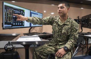 Veteran in front of a computer 