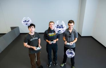 George Mason students with drones
