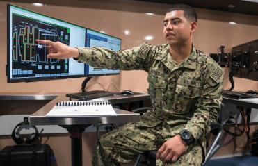 Veteran working with technology