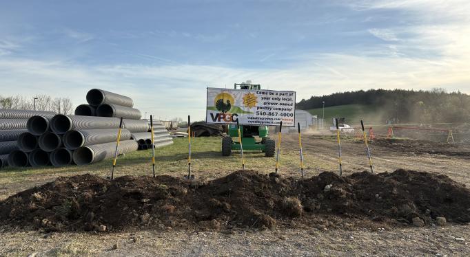 Photo of shovels breaking ground at new site