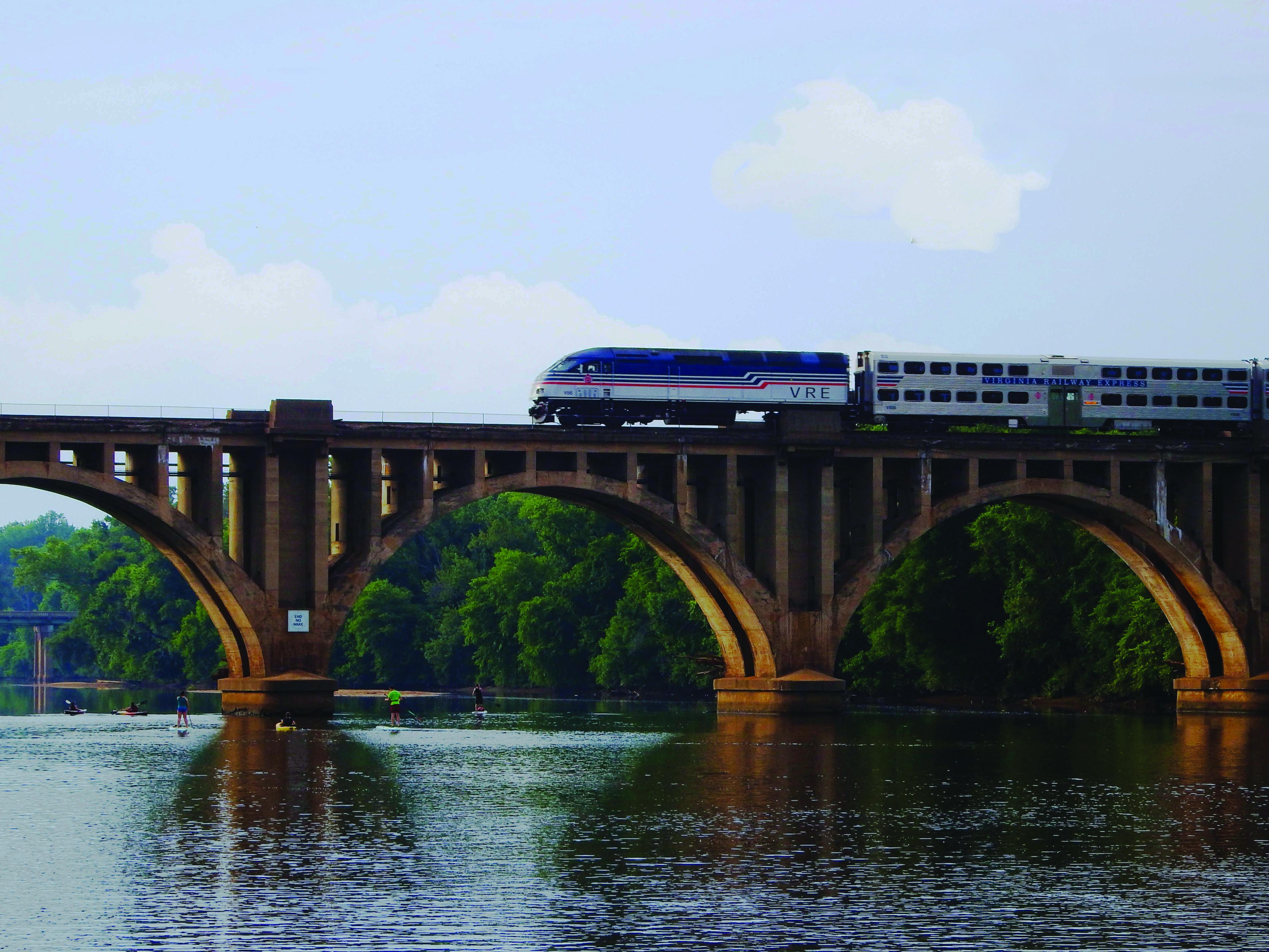 Train on a bridge over a river
