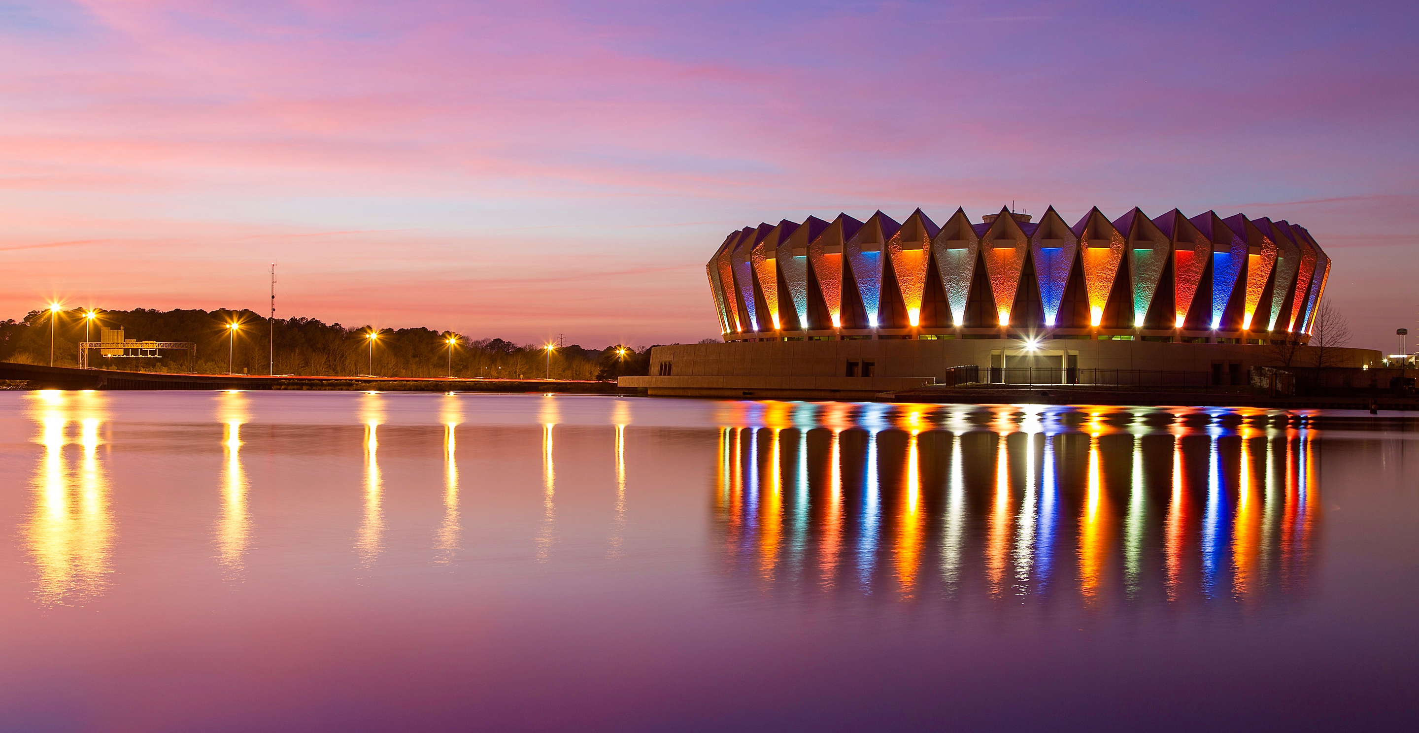Coliseum reflecting on the water