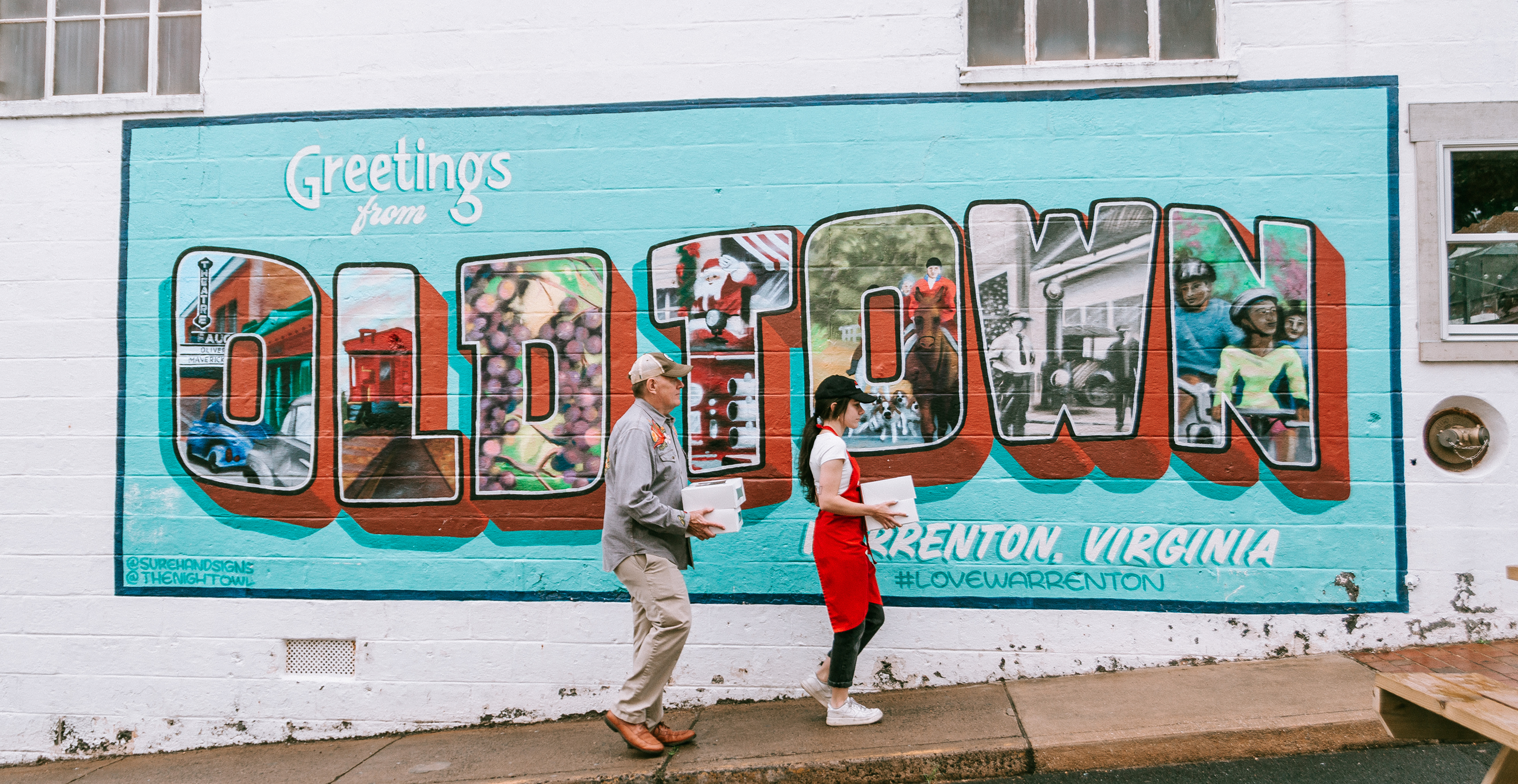 People in front of a mural in Warrenton Virginia