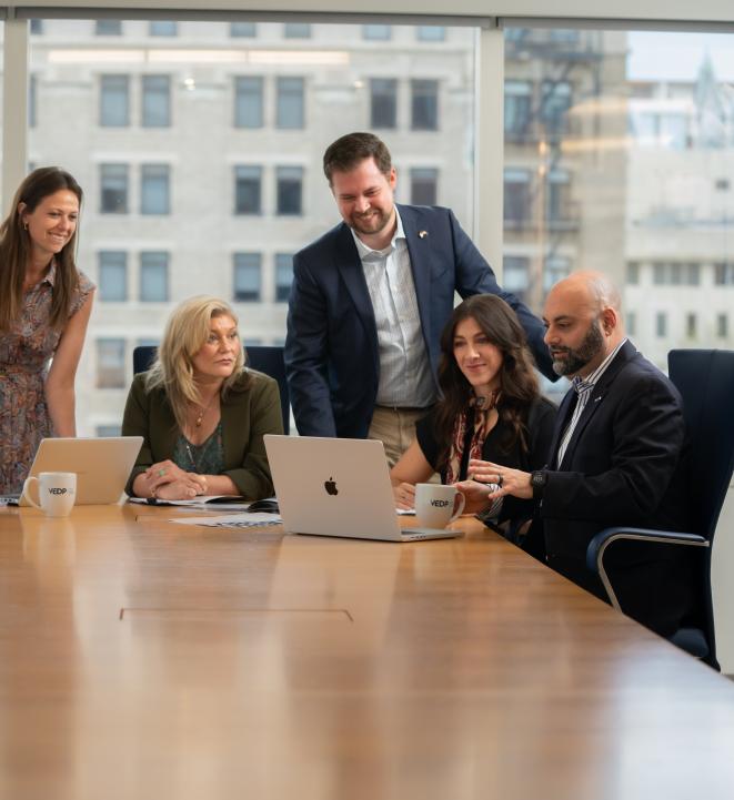 VEDP Staff at a conference table