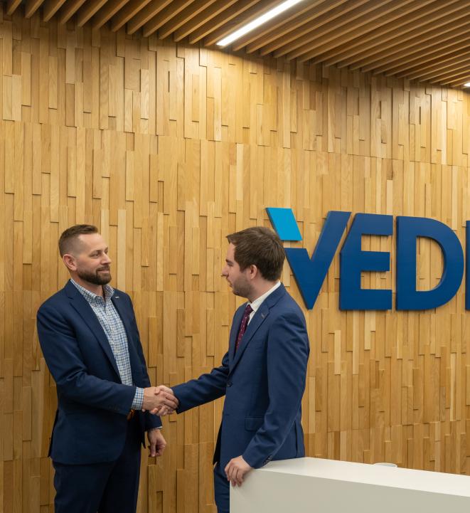 VEDP Staff shaking hands