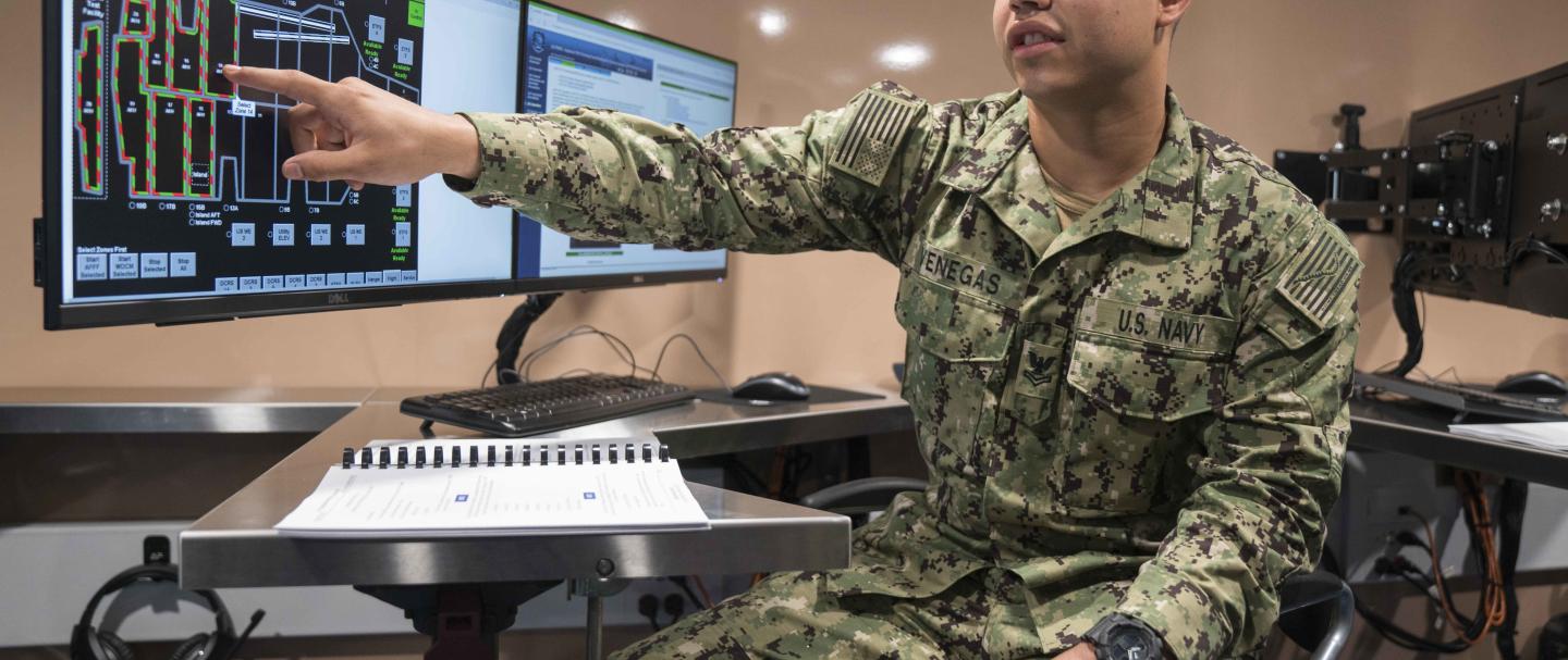 Veteran in front of a computer 