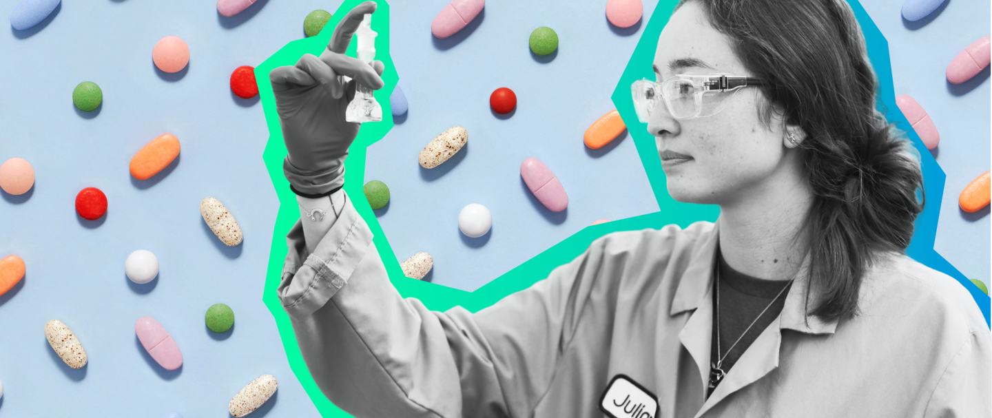 Merck scientist looking a vile. 