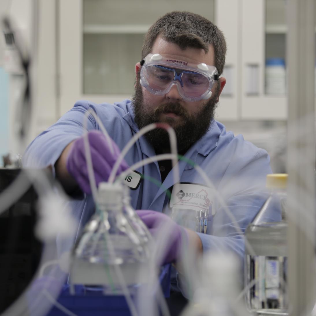 A man working with laboratory equipment