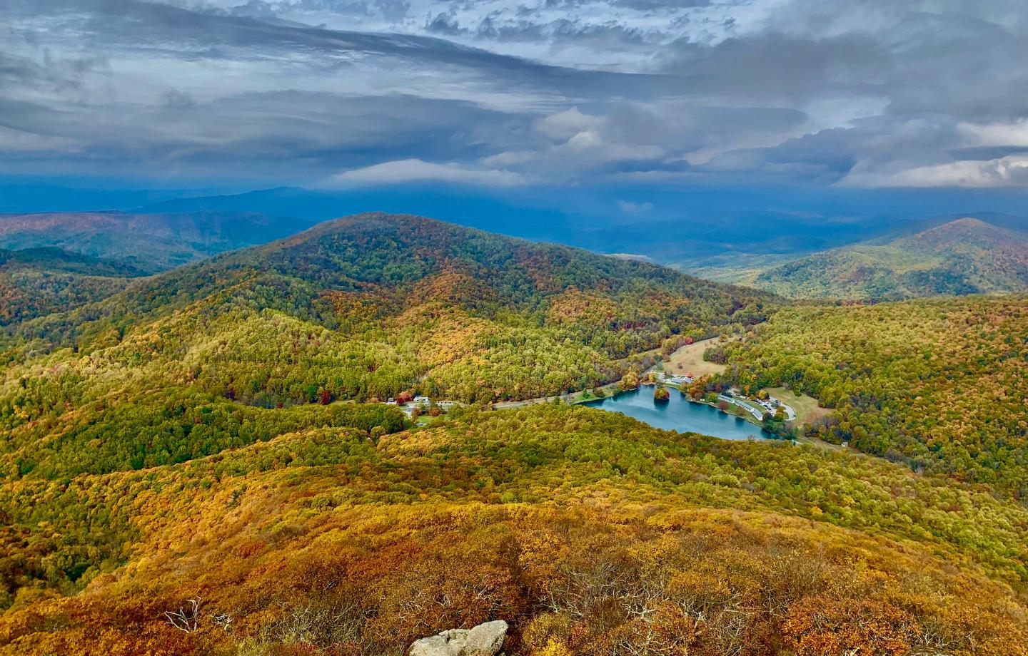 Peaks of Otter rolling hills with lake