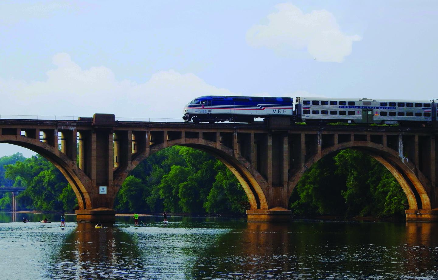 Train on a bridge over a river
