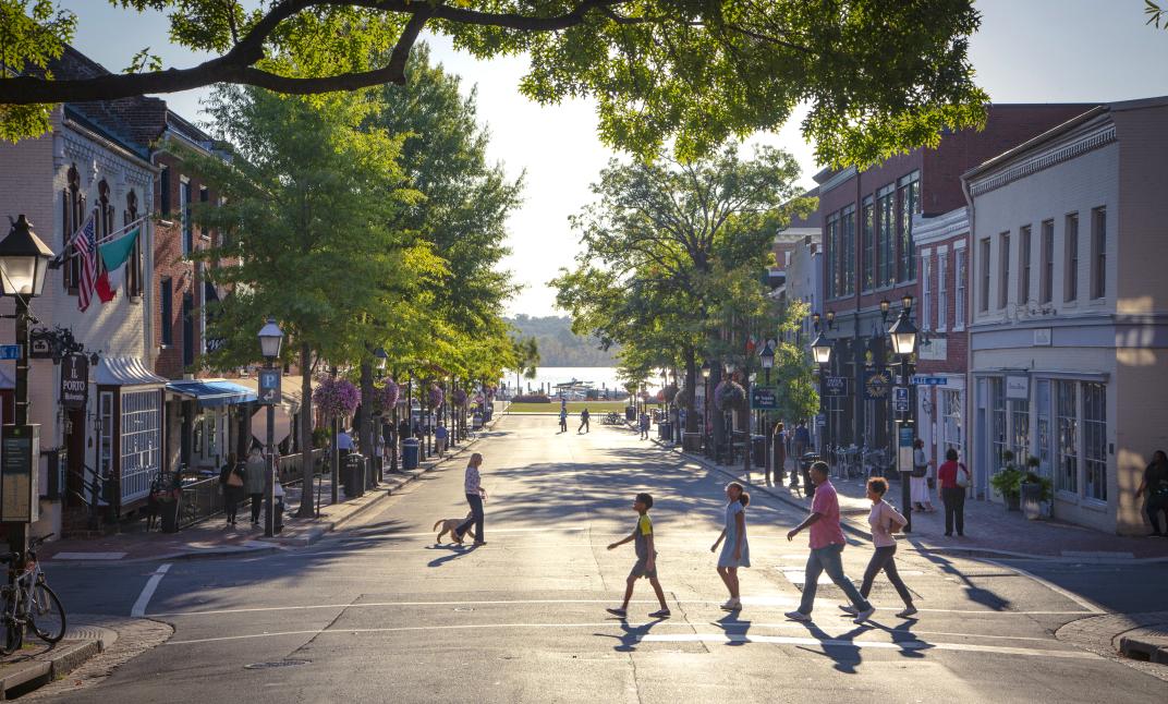 People walking across the street in Old Town Alexandria