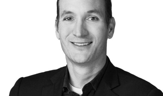 Black and white headshot of Brand Medairy