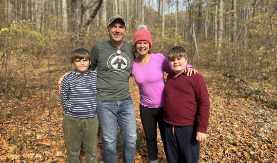 VEDP CEO and President, Jason El Koubi stands with his family while on a hike in Virginia's Shenandoah Valley