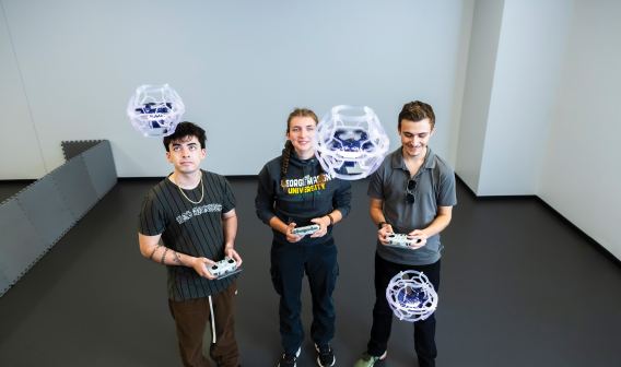 George Mason students with drones