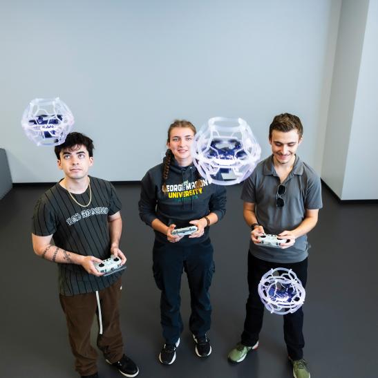 George Mason students with drones