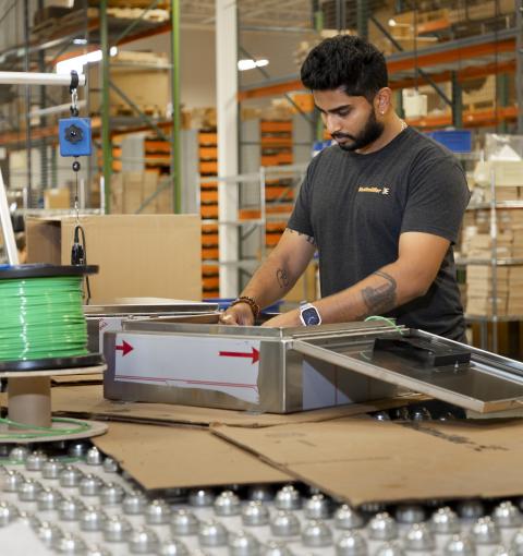 Employee working on machinery