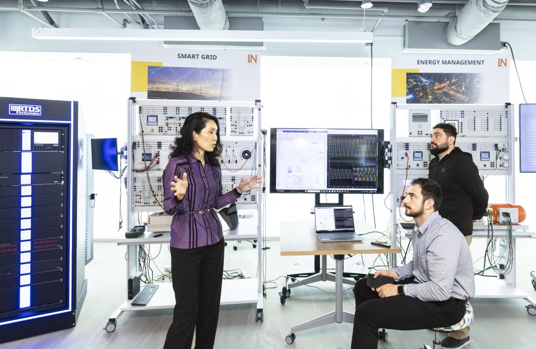 Three employees of the Smart Grid Lab at George Mason University