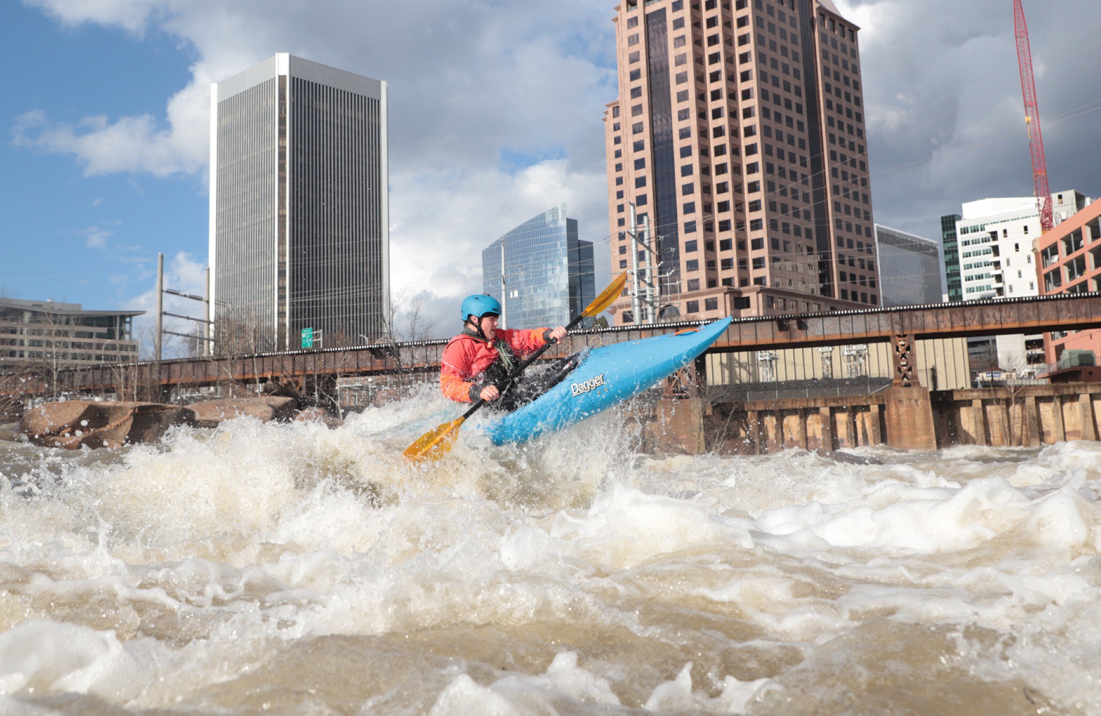 Man urban whitewater rafting in Richmond