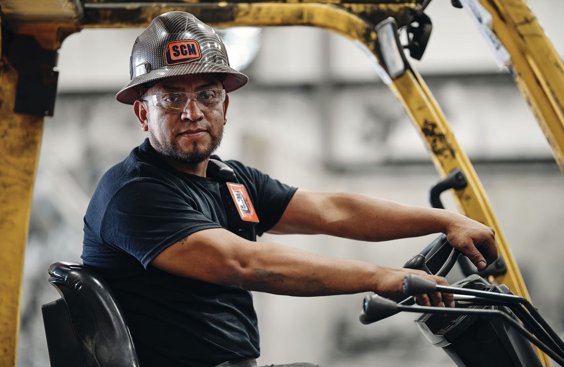 Service Center Metals employee operating machinery. 