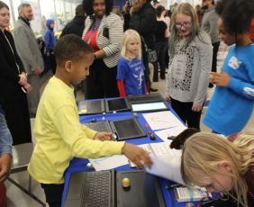 Elementary school students in South Boston use robots to learn coding principles