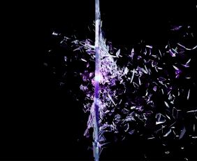 A black image of purple glass shattering