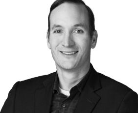 Black and white headshot of Brand Medairy