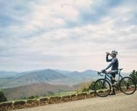 Cyclist takes a break on the Blue Ridge Mountain Parkway