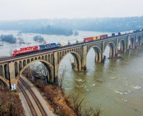 CSX Locomotive train going over a bride on the James River in Richmond