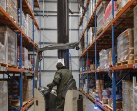 Person operating machine at WCS Logistics facility