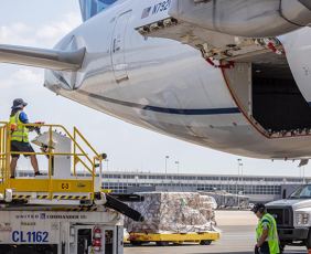 United Airlines plane and employee at Dulles